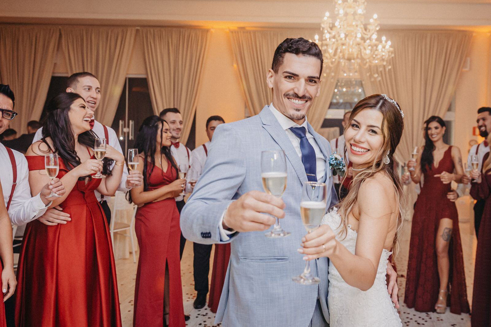 Bride and groom toasting with guests at a wedding reception with a live sushi station in New York