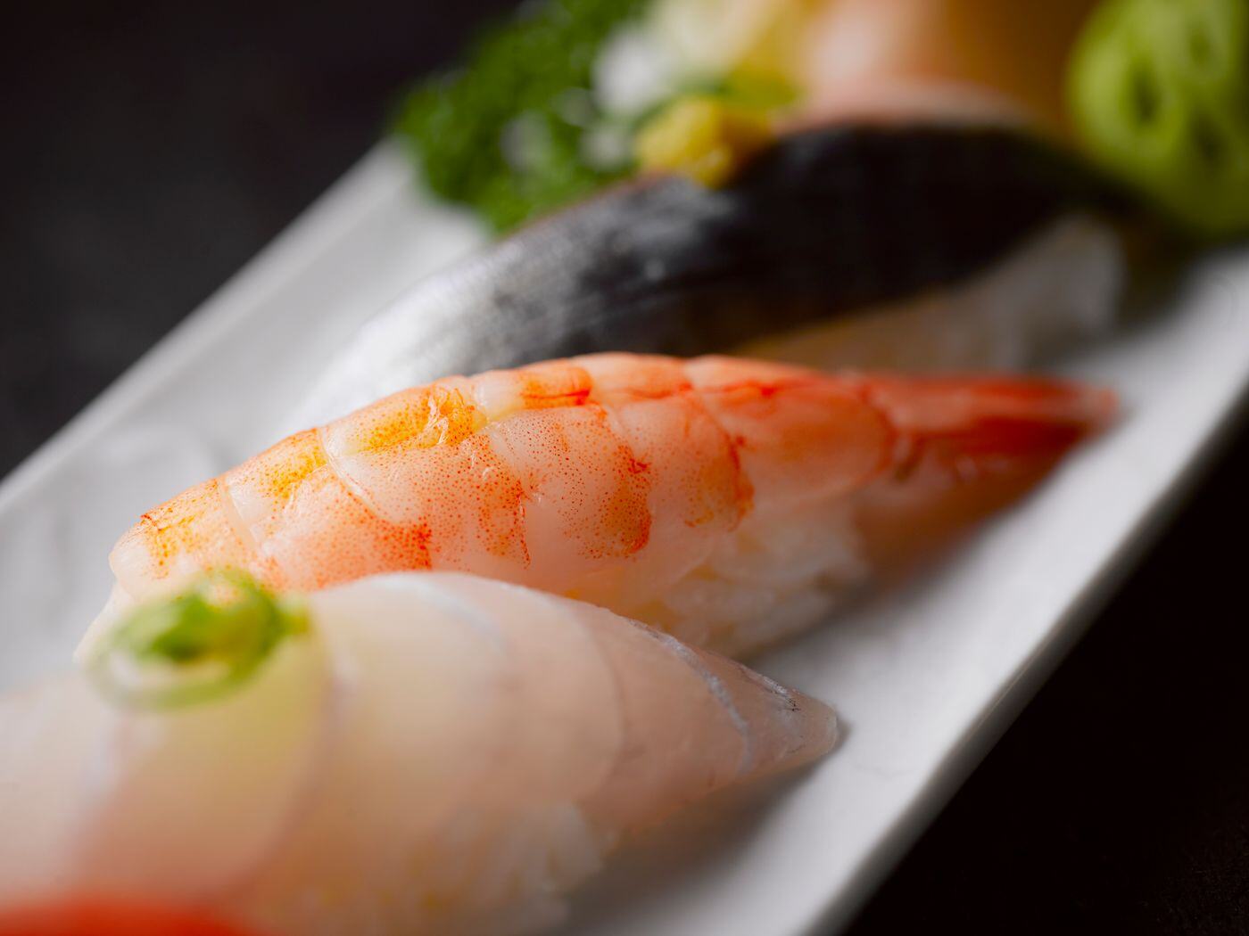 Botan ebi and white fish nigiri close-up Botan ebi and white fish nigiri close-up
