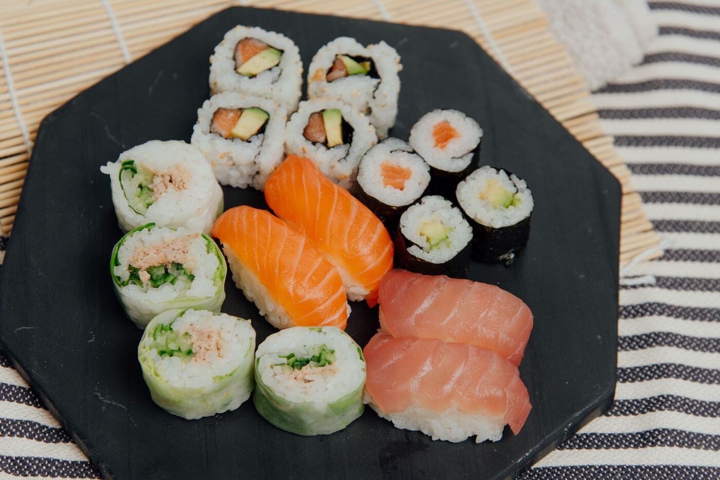 Sushi rolls and salmon nigiri platter Sushi rolls and salmon nigiri platter