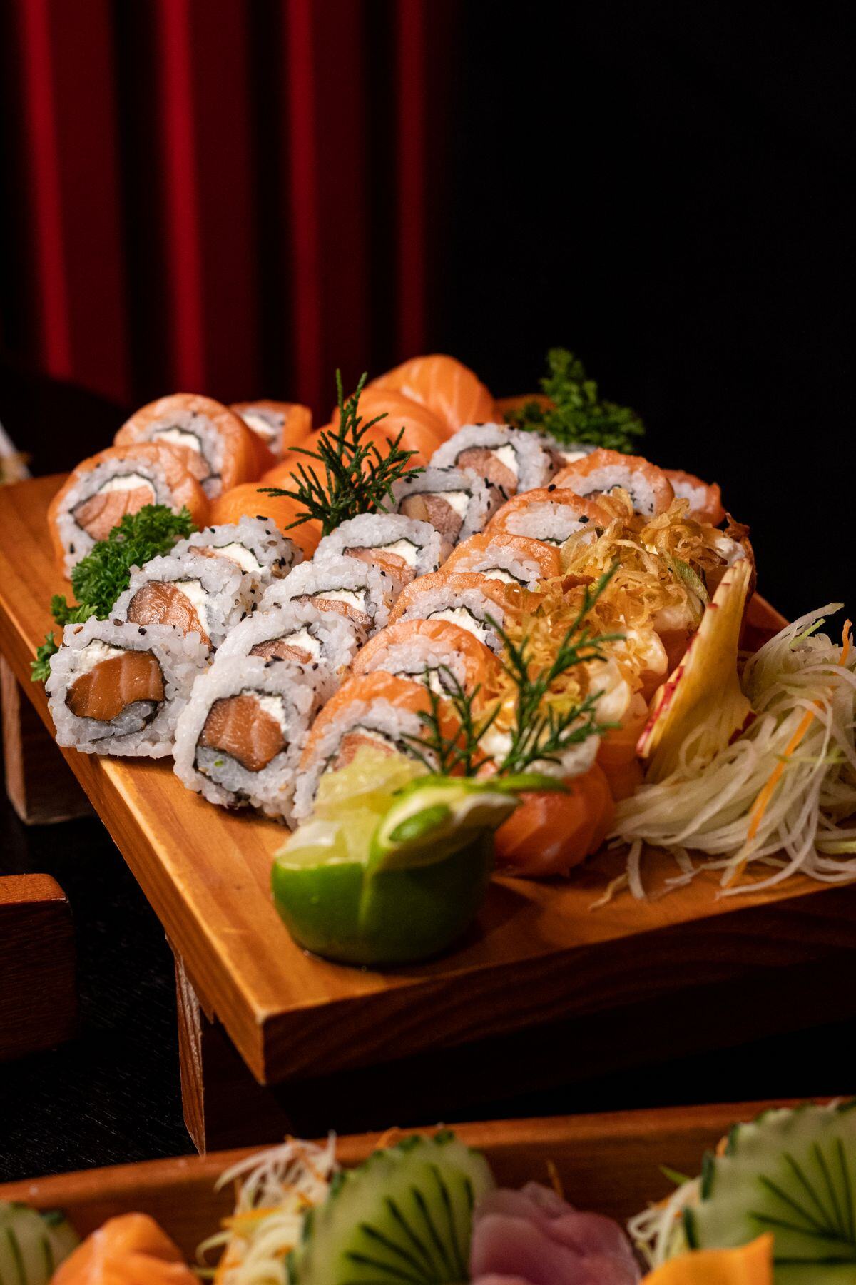 Three sushi boats for a large catered event Three sushi boats for a large catered event
