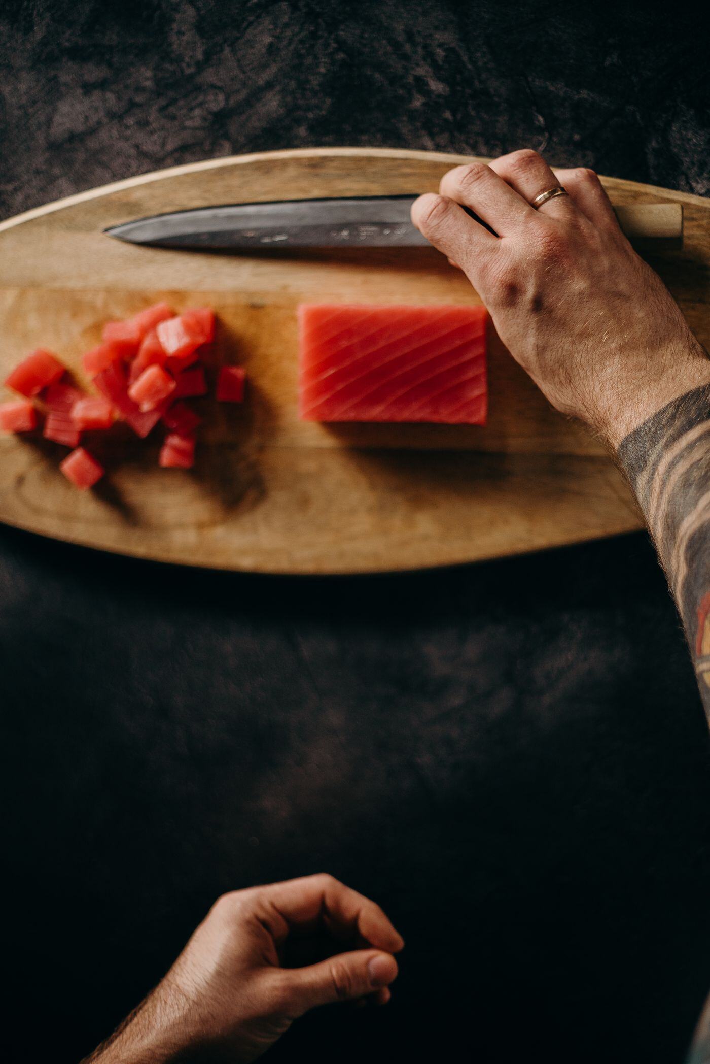 Akami tuna sliced on a wooden board Akami tuna sliced on a wooden board
